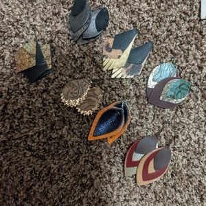 7 pairs of layered leather earrings